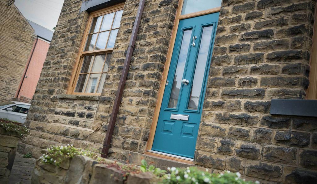 A strong and secure composite door in teal gives a modern and contemporary look Weymouth