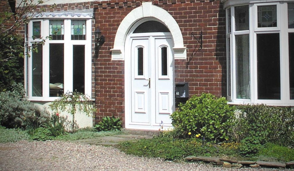 White uPVC entrance door with side panel Weymouth