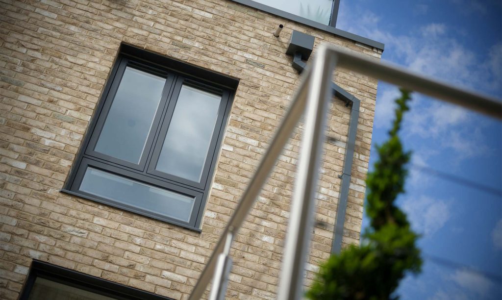 Modern anthracite grey uPVC windows on modern property Weymouth