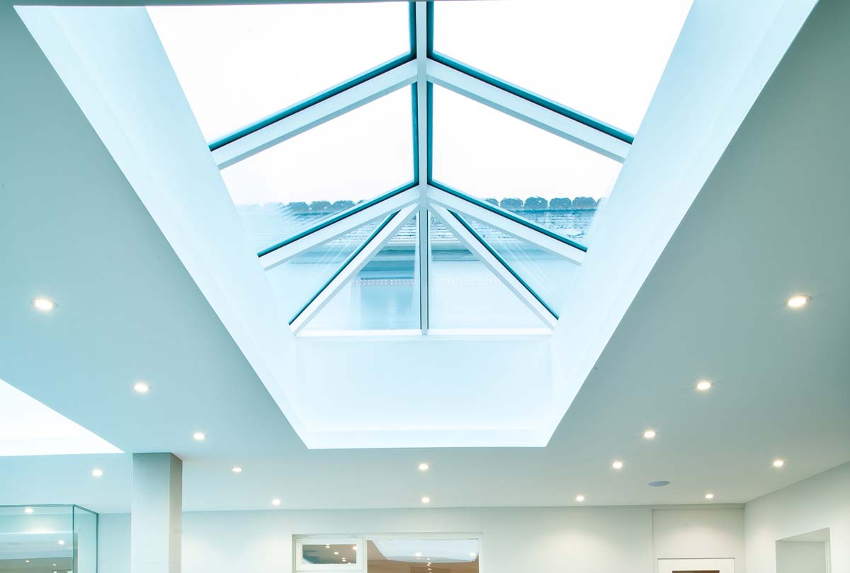Glass lantern roof in a modern extension with downlights Portland