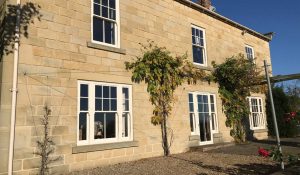 White sliding sash windows with authentic timber appearance