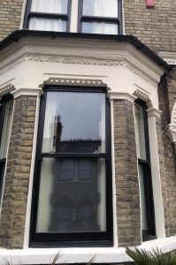 Sliding sash windows in black Poole