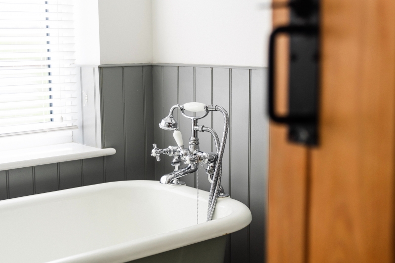 Bath Tub with Tap in bathroom